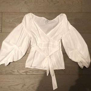 White blouse with puff sleeve.